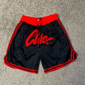 Red and black medium sized basketball shorts